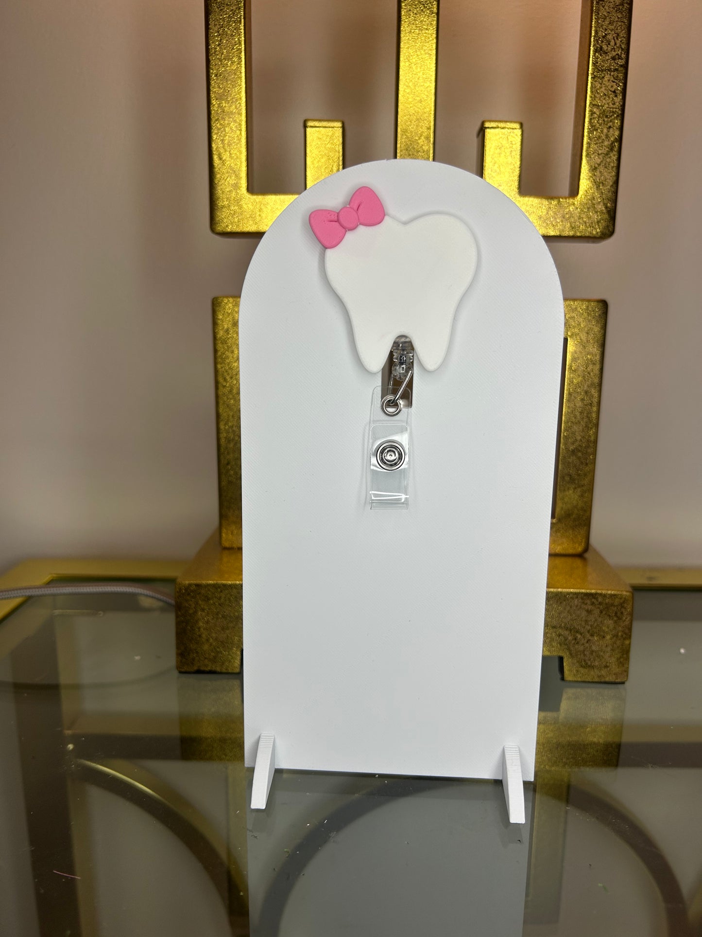 Dental tooth badge reel